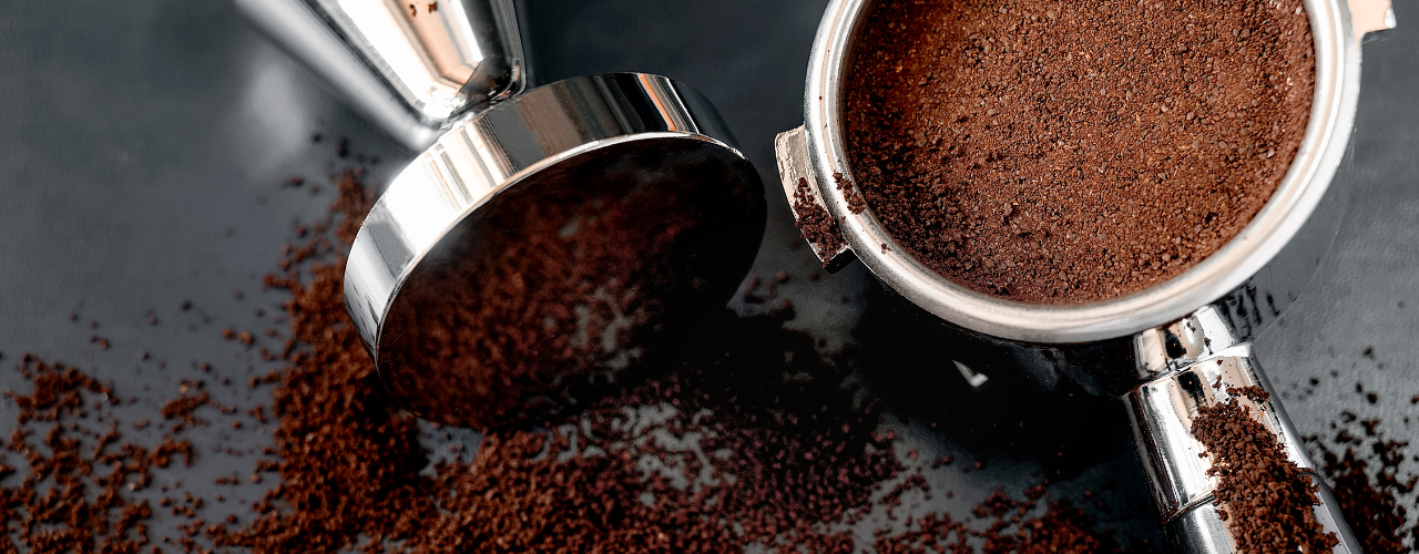 Why Do People Spray Coffee Beans with Water Before Grinding?
